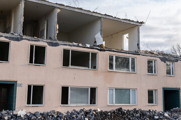 Demolition of low-rise residential building. Reconstruction, restoring damaged building. Destroyed...