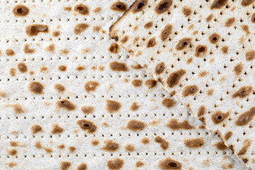 Matzah. Jewish traditional Passover bread. Pesach celebration symbol. Close-up.