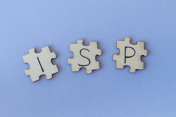 Obraz premium The acronym ISP, which stands for Internet Service Provider. The letters written on the puzzles.