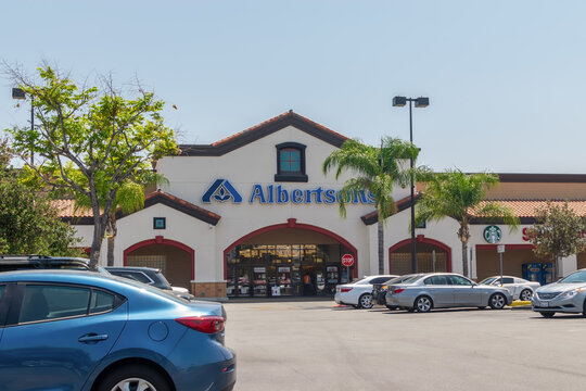 Corona, CA USA - August 16, 2018: Albertsons grocery store entrance with a Starbucks and Savon Pharmacy inside the store.