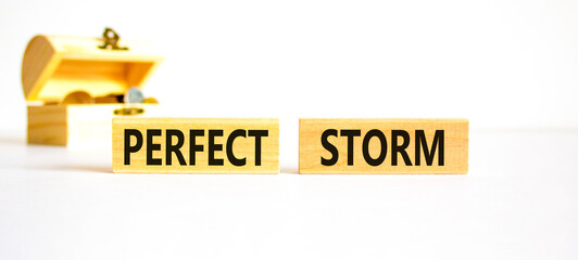Perfect storm symbol. Concept words Perfect storm on beautiful wooden block. Beautiful white table white background. Wooden chest with coins. Business and Perfect storm concept. Copy space.