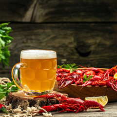crayfish beer with lemon on a wooden background. Beer brewery concept. Snack for beer