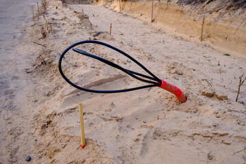 Construction of a new road in the initial stage. . construction of communications. Cables for light...