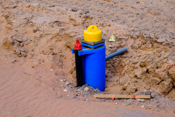 Construction of a new road in the initial stage. . construction of communications. construction of water hydrants