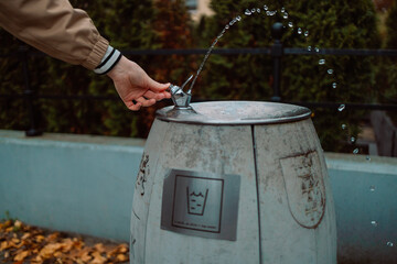 Drinking water fountain in park on a sunny day, no person. Selective focus. High quality photo