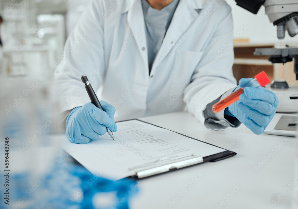 Aufkleber Keeping record of experiments matters. Shot of a scientist holding a sample while making notes.