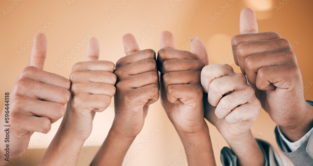 Poster Showing some support. Shot of a group of unrecognizable businesspeople showing a thumbs up at work.