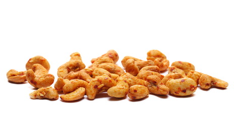 Cashews nuts with cheese and chilli isolated on white, side view