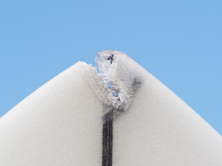 Damaged part on nose to repair on a surfboard.
