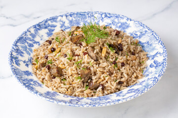 Traditional delicious Turkish food; rice pilaf with pine nuts and currants (Turkish name; ic pilav or pilaf)