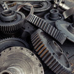 Spur, helical and bevel gears construction and production. Rusted metal