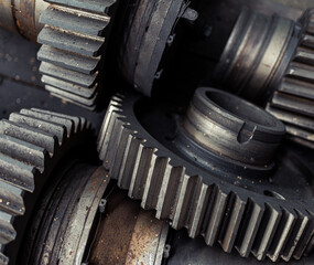Spur, helical and bevel gears construction and production. Rusted metal