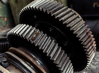 Spur, helical and bevel gears construction and production. Rusted metal