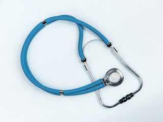 Lodz Poland April 25 2023 Medical stethoscope tool on blue background, top view