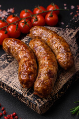 Delicious fried grilled sausages with salt, spices and herbs
