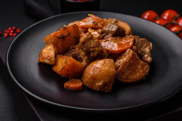 Delicious fresh cooked stew with pork meat or beef with potatoes, carrots, spices and herbs