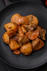 Delicious fresh cooked stew with pork meat or beef with potatoes, carrots, spices and herbs
