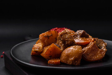 Delicious fresh cooked stew with pork meat or beef with potatoes, carrots, spices and herbs