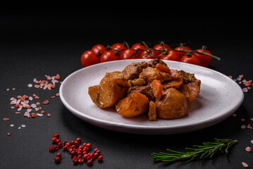 Delicious fresh cooked stew with pork meat or beef with potatoes, carrots, spices and herbs