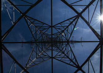 Tower of a high voltage electric line. Bottom view.
