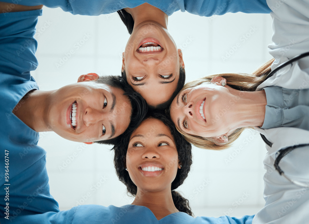 Poster There are times for playing. Cropped shot of a group of medical practitioners having a private huddle at work.