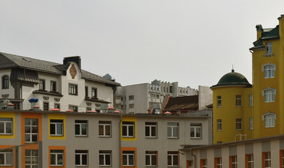 Fototapeta na wymiar Panorama of beautiful houses, newly built modern family houses. City street on a sunny day.