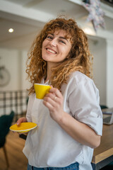 Woman adult caucasian female happy smile hold cup of coffee at cafe