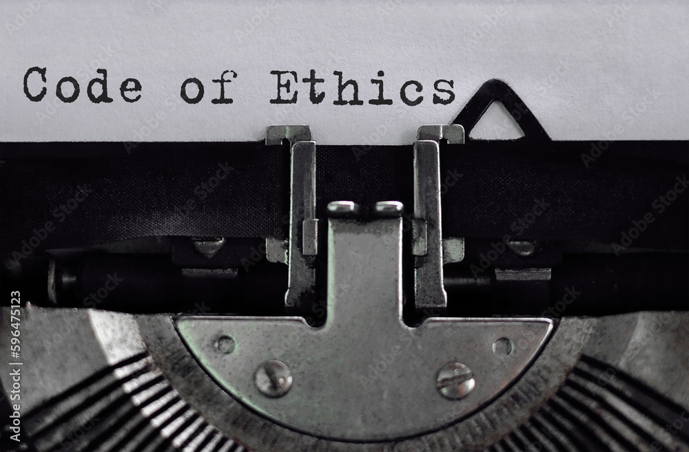 Poster text code of ethics typed on retro typewriter