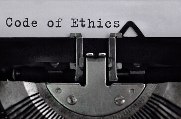 Text Code of Ethics typed on retro typewriter