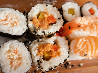 Sushi platter with nigiri, hoso maki, california maki and futo maki