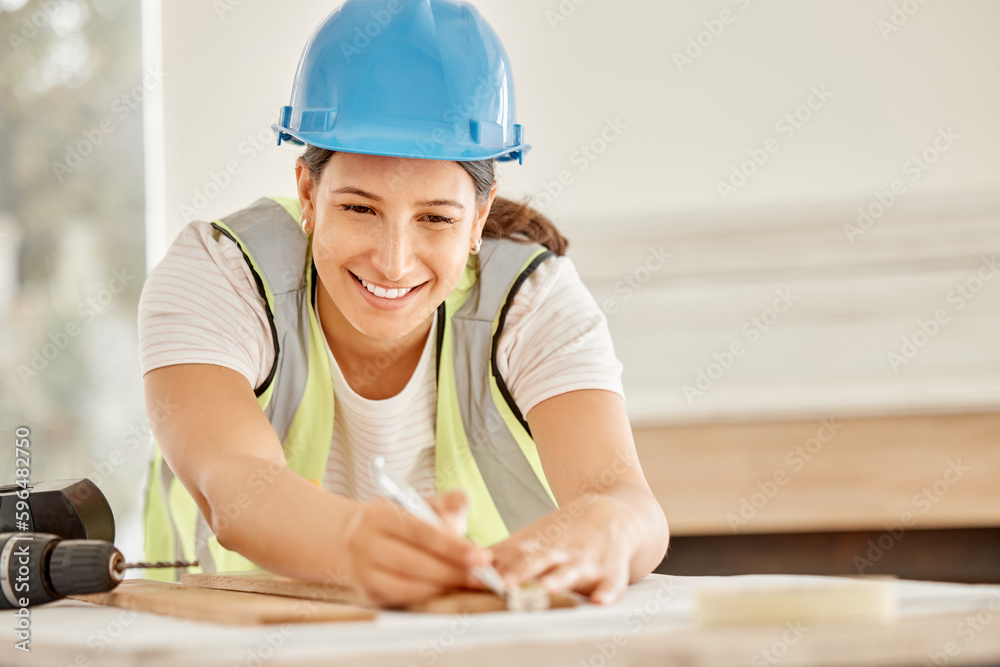 Poster im happy with these measurements. shot of an attractive young construction worker standing alone and
