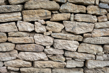 Fototapeta premium White stone slabs, limestone for natural walls. Natural computer background and wallpaper