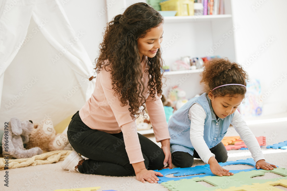 Canvas Prints The love of a daughter makes life worth living. Shot of a young mother and daughter spending time together at home.