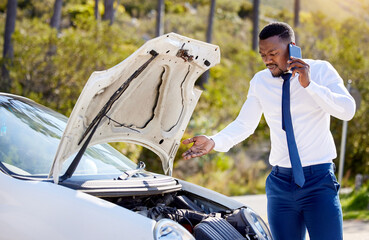 I need you guys here asap. Cropped shot of a handsome businessman on the phone with roadside...