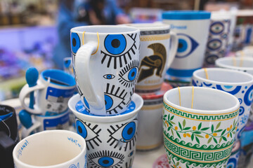 View of traditional tourist souvenirs and gifts from Athens, Attica, Greece with fridge magnets with text 