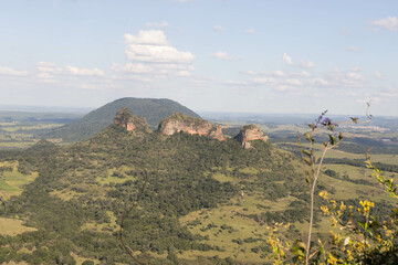 This breathtaking photo captures the stunning view from the top of Pedra do Indio in Botucatu,...