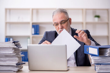 Old male employee and too much work at workplace