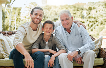 Sustain yourself with the love of family. Shot of a man sitting outside with son and his elderly...