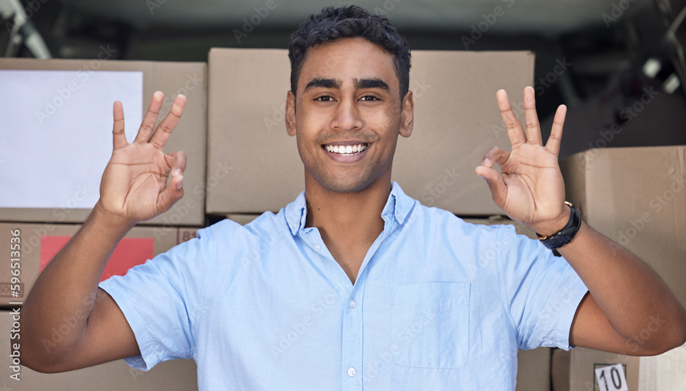 Poster Your parcel is in safe hands with me, I promise. Portrait of a young delivery man gesturing an okay sign while loading boxes from a van.