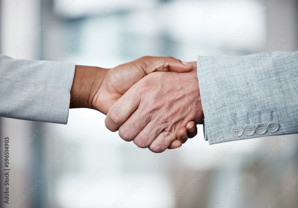 Poster weve made a deal. shot of two unrecognizable businespeople shaking hands in an office at work.