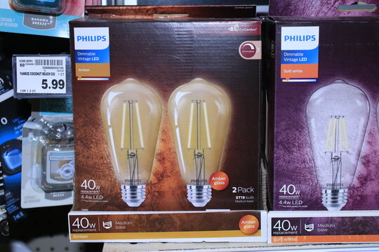 Philips light bulbs in boxes on a shelf
