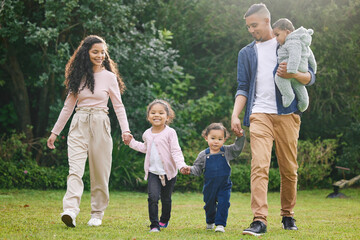 Obraz premium Time is non-refundable - use it with intention. Shot of a happy family bonding together outdoors.