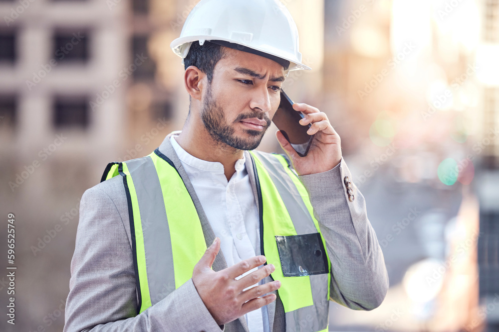 Poster Changes Now. Cropped shot of a handsome male construction worker making a call while standing on a building site.