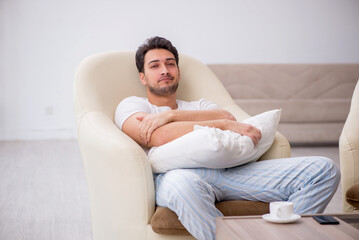 Fototapeta premium Young man starting day at home