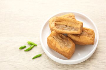 Tahu Bakso, made from tofu filled with meatball dough, served with chili. Indonesian traditional food 

