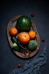 fresh fruits on a black table