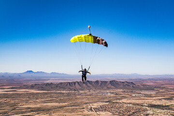 Parachute over desert mountains