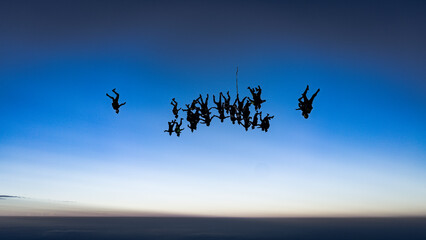 Fototapeta na wymiar Skydive Formation Silhouette 
