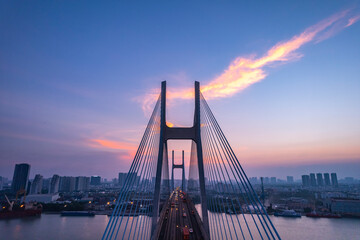 Sunset at Phu My bridge, Saigon riverside, Ho Chi Minh city, Vietnam. April 2023
