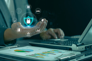 Cybersecurity privacy of data protection, Businessman hand and encrypt virtual lock screen icon....